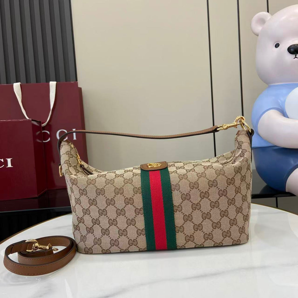 Gucci hobo bag with GG canvas, green and red web stripe, gold-tone hardware