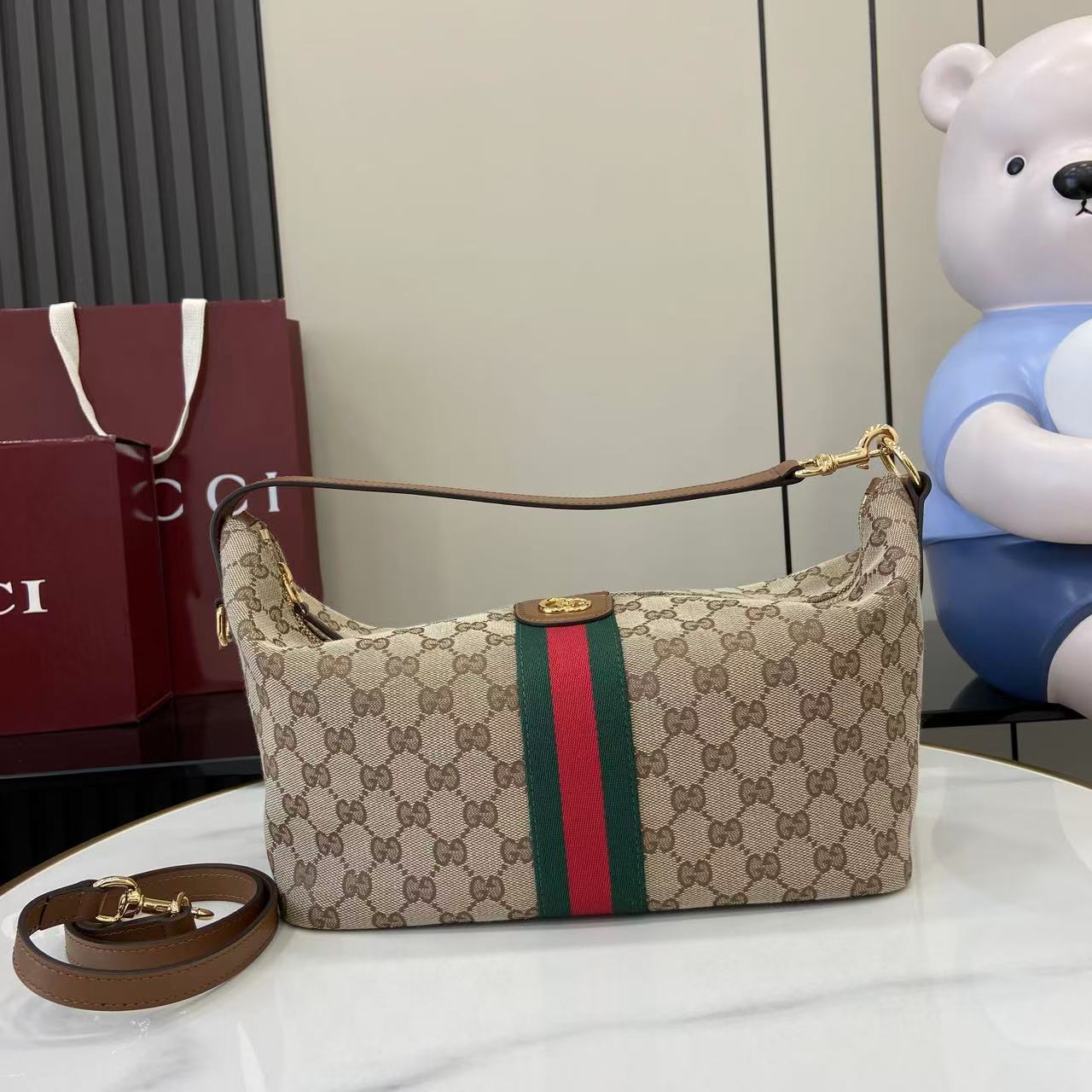 Gucci hobo bag with GG canvas, green and red web stripe, gold-tone hardware