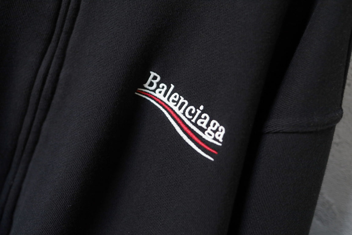 Balenciaga hoodie logo close-up with red-and-white stripe lettering