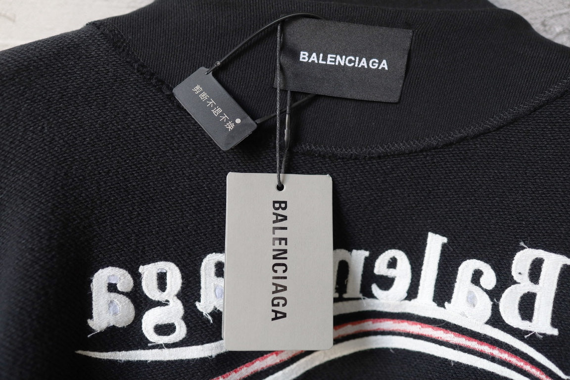 Balenciaga hoodie neck label and white hang tag on graphic lettering