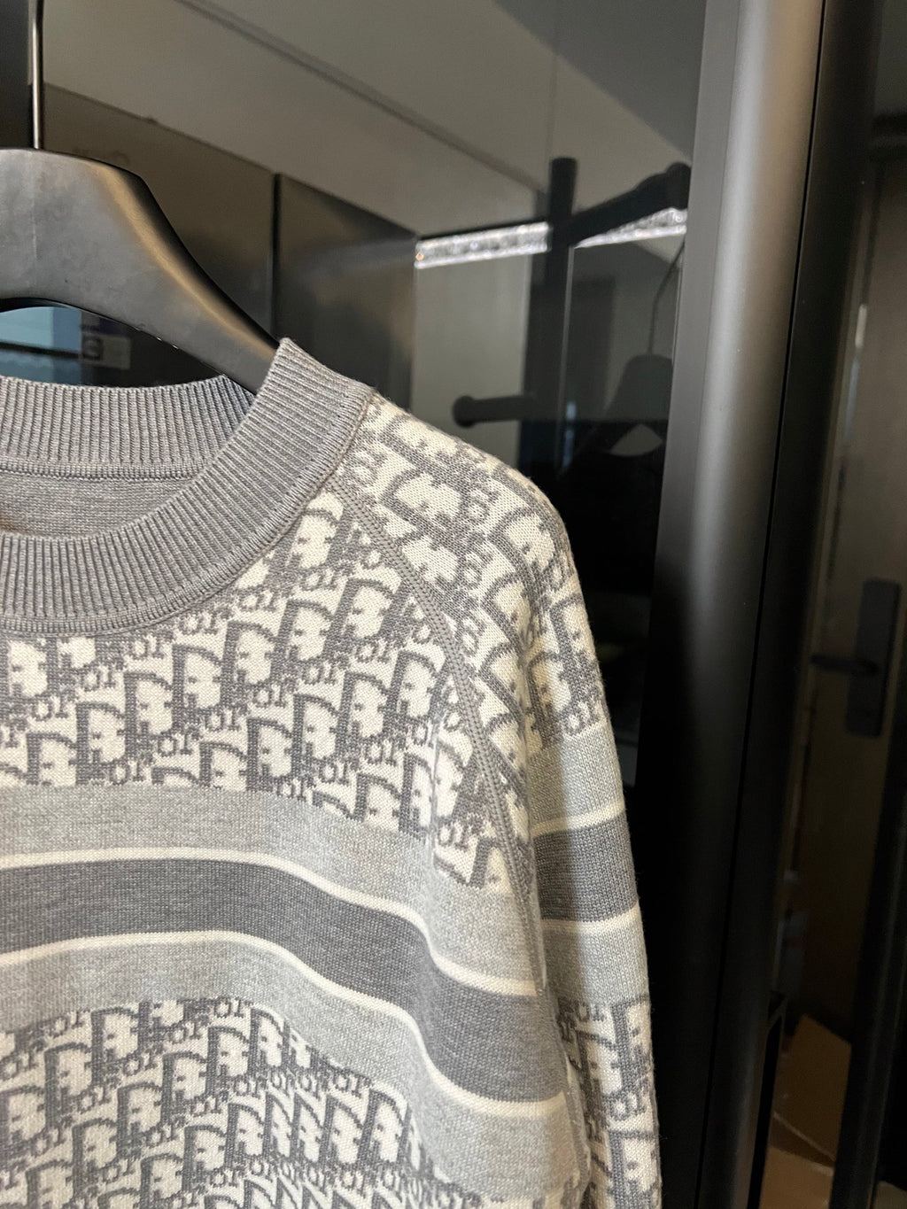 Light gray Dior monogram knit sweater with crew neckline and wide gray stripe