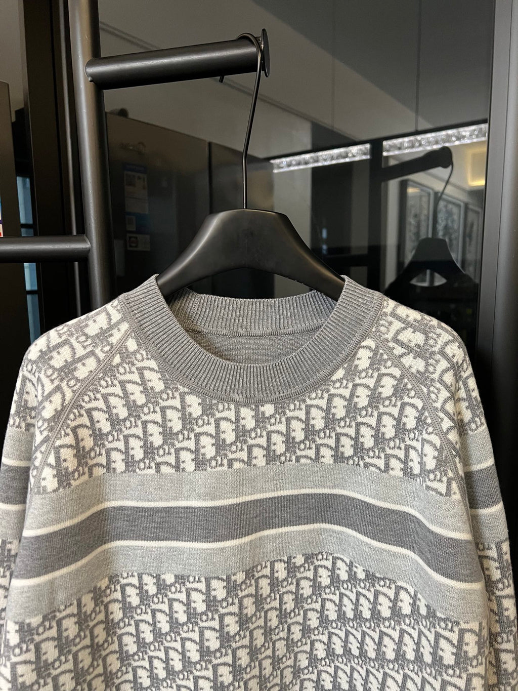 Light gray Dior monogram knit sweater with ribbed crew neckline and striped band