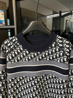 Long-sleeve knit sweater, white logo monogram print on navy with ribbed neckline