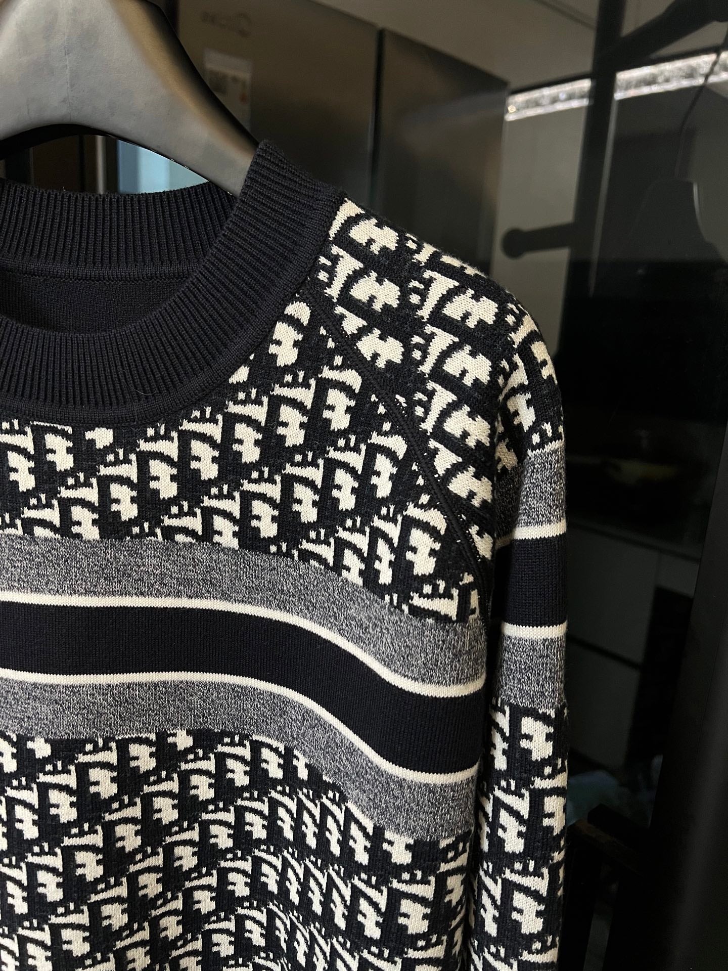 Long-sleeve knit sweater shoulder, navy with white logo knit and gray stripe
