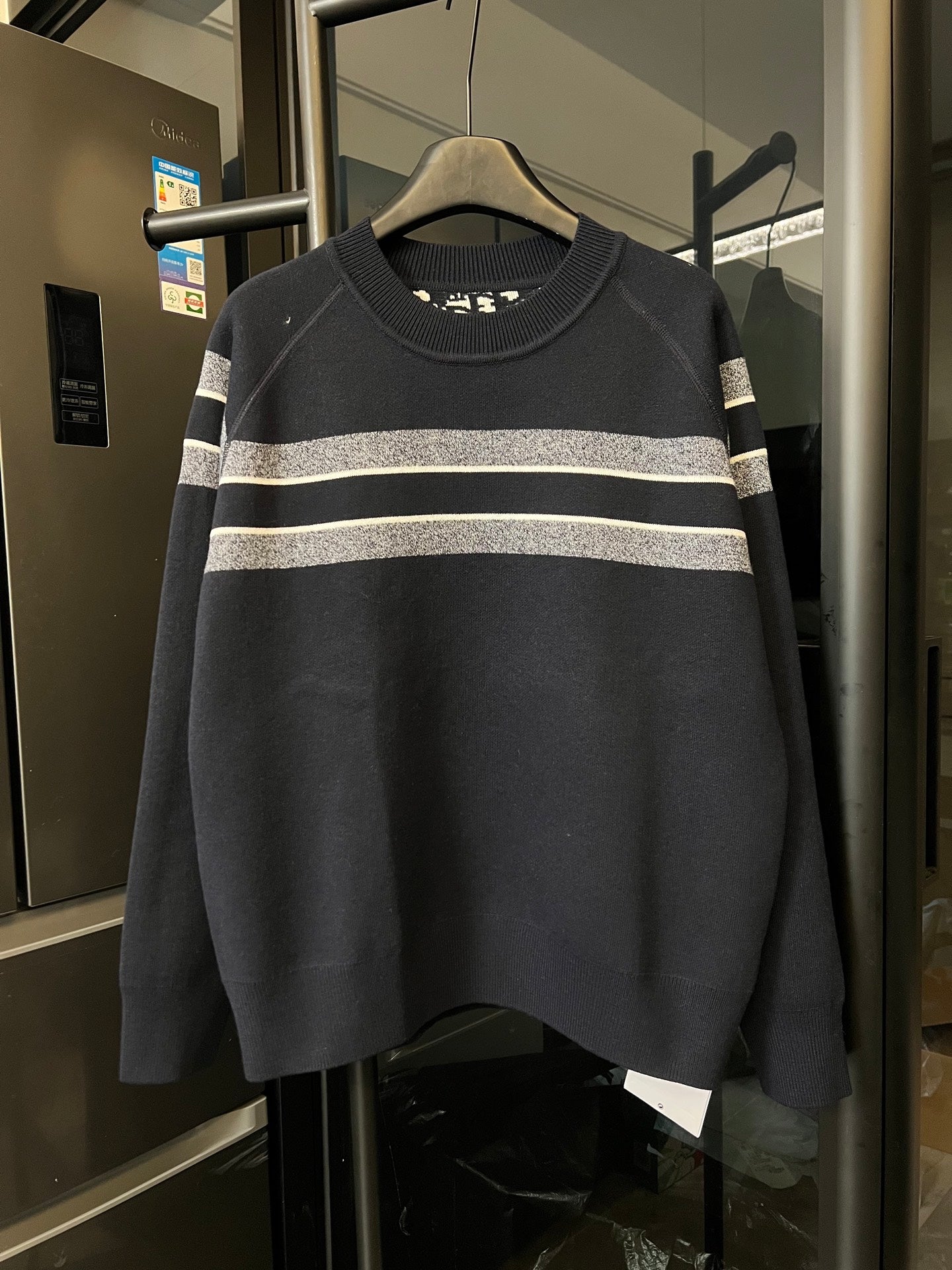 Long-sleeve knit sweater, dark navy with light gray and white horizontal stripe