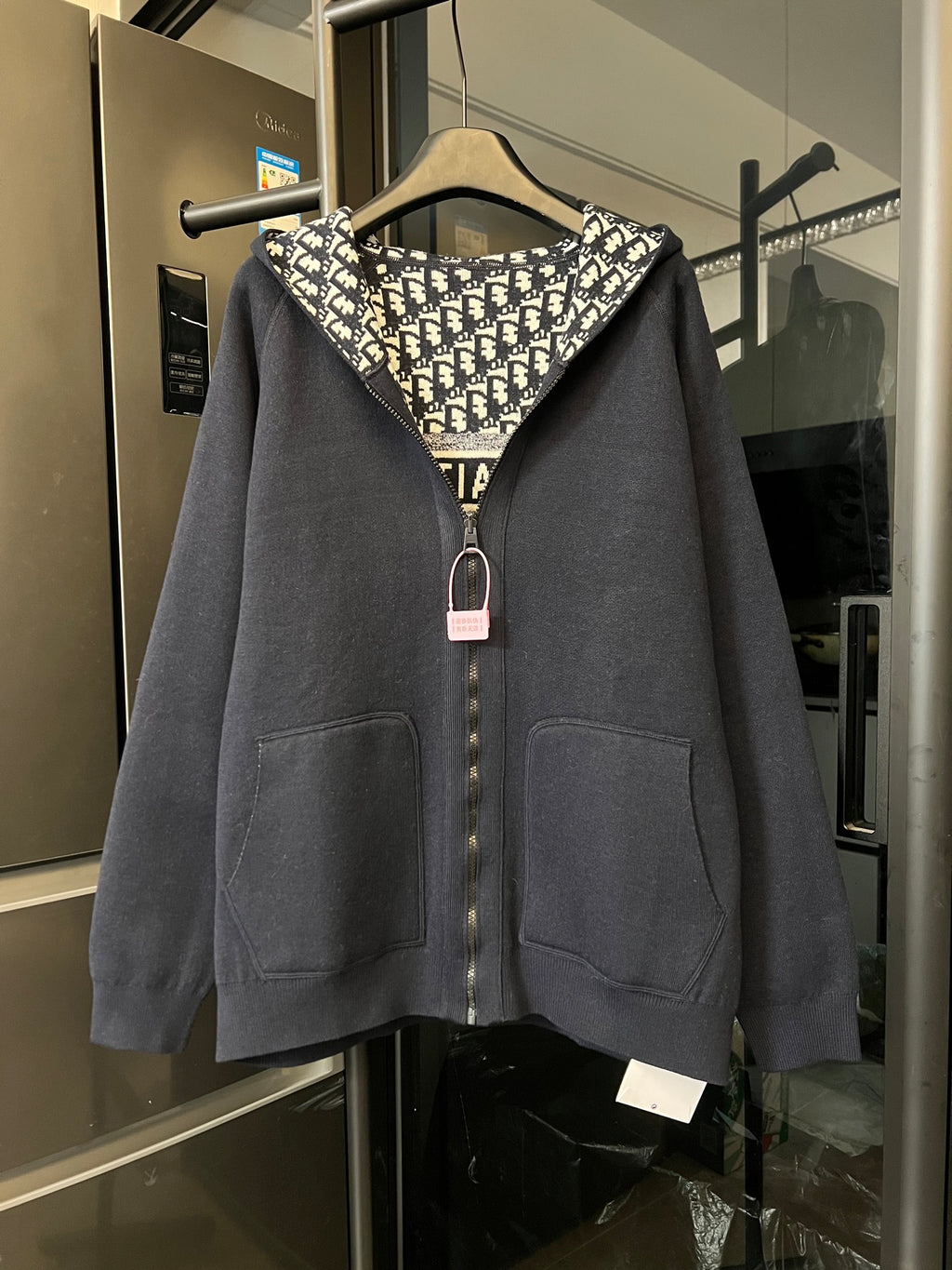 Dior long zip hoodie in dark gray with front pockets and patterned hood lining