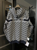 Dior long zip hoodie with black-and-white monogram print and “CHRISTIAN DIOR” band