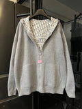 Zip-up hoodie with hood, light gray base, and Dior monogram panel detail