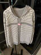Zip-up hoodie with Dior monogram pattern, hood, and front zipper detail
