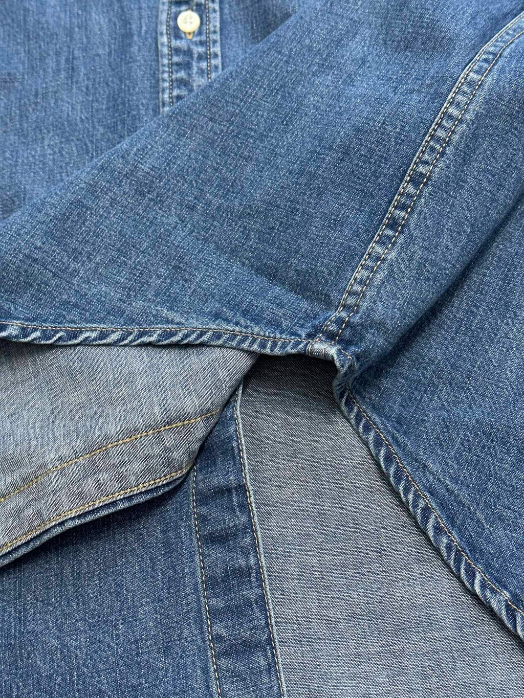 Ralph Lauren blue denim shirt close-up of shoulder seam and buttoned placket