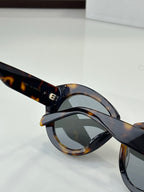 Celine sunglasses side view with tinted lenses and tortoiseshell temple arm