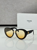 Celine round sunglasses with yellow lenses and tortoiseshell frame details