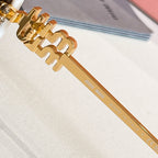 MiuMiu gold metal sunglasses temple with logo print and engraved text
