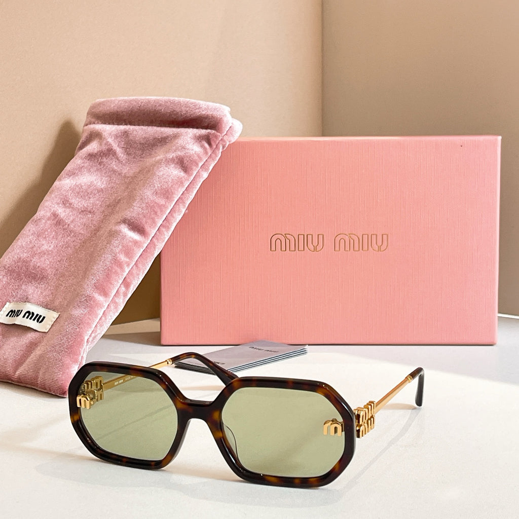 MiuMiu sunglasses with tortoiseshell oversized frames, green-tinted lenses, and gold logo detailing