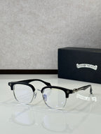 Black full-rim metal eyeglasses with clear lenses and gold details