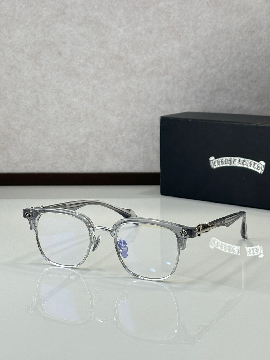 Silver full-rim metal eyeglasses with clear lenses, front view