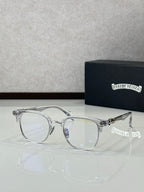 Silver full-rim metal eyeglasses with clear lenses and curved arms