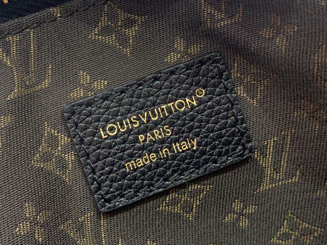 Louis Vuitton made in Italy logo patch on black leather