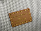 Louis Vuitton leather brand patch with stitched border on the belt bag