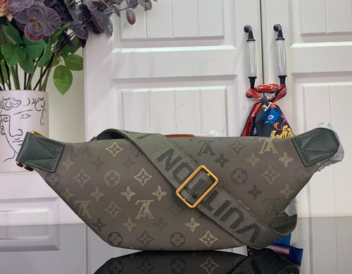 Louis Vuitton monogram belt bag with front buckle and green leather tabs
