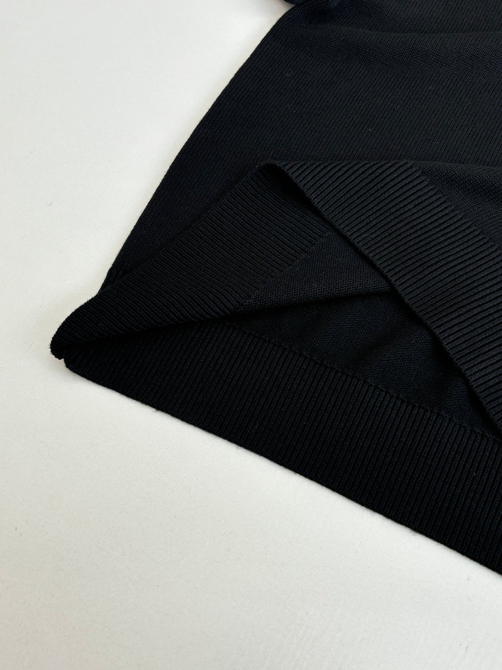 Black Versace crewneck sweater ribbed hem and knit texture