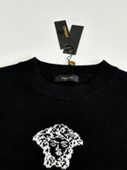 Black Versace crewneck sweater neckline with crest logo