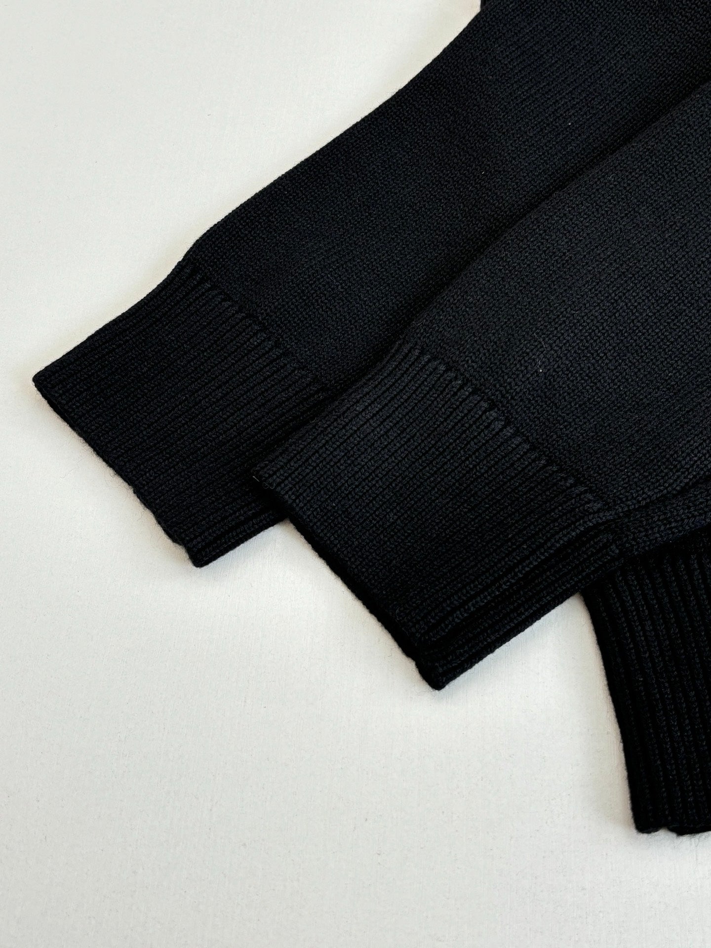 Black Versace crewneck sweater ribbed sleeve cuffs