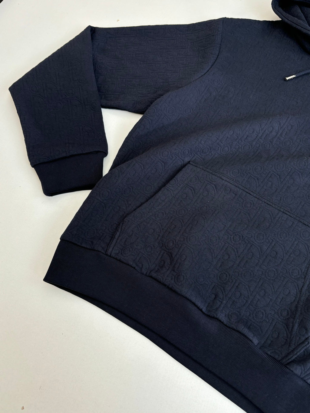 Dior navy long pants with ribbed cuffs, textured monogram pattern