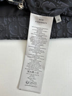 Dior long garment care label on dark inner lining