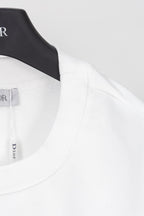 White sweatshirt neckline and shoulder seam with ribbed collar trim