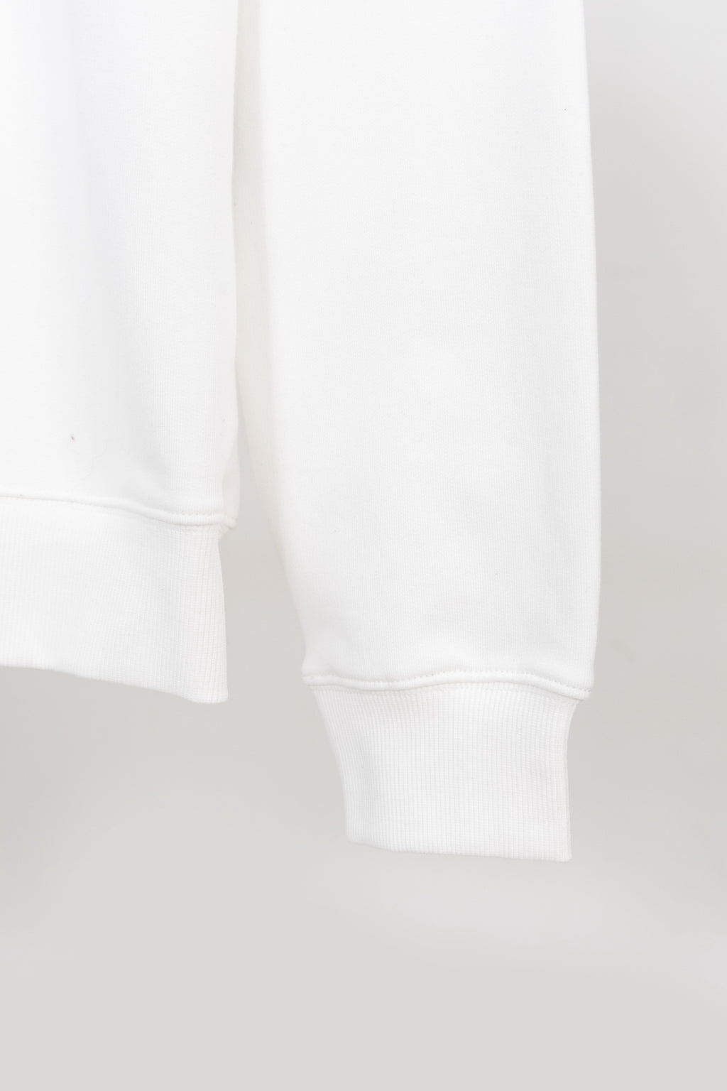 White sweatshirt with ribbed cuffs and elasticated hem