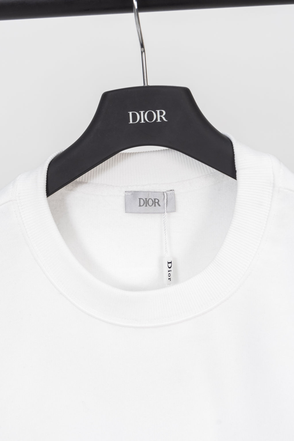 White sweatshirt crew neck with ribbed trim and Dior label on inner neckline
