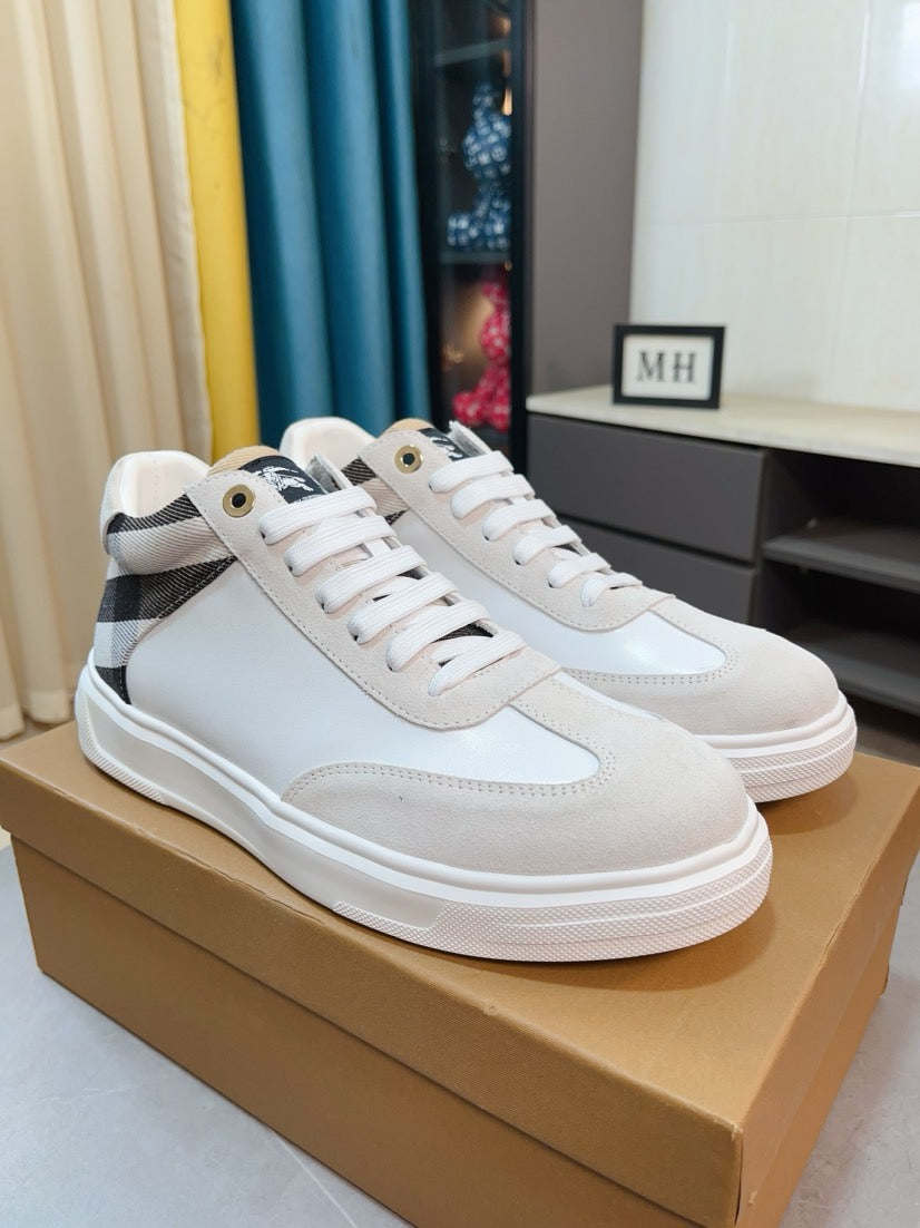 White lace-up sneakers with black-and-white plaid side detail