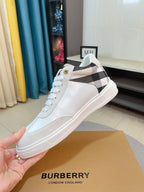 White sneaker with black-and-white check collar and lace-up