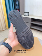 Burberry sneaker outsole in dark rubber with herringbone tread pattern