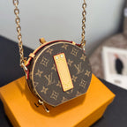 Round mini crossbody bag, brown monogram canvas with tan leather front and red trim