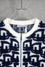 Navy-and-white knit sweater neckline with ribbed trim and zip front, Dior tag.