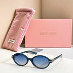 MiuMiu round sunglasses with dark frame and blue tinted lenses