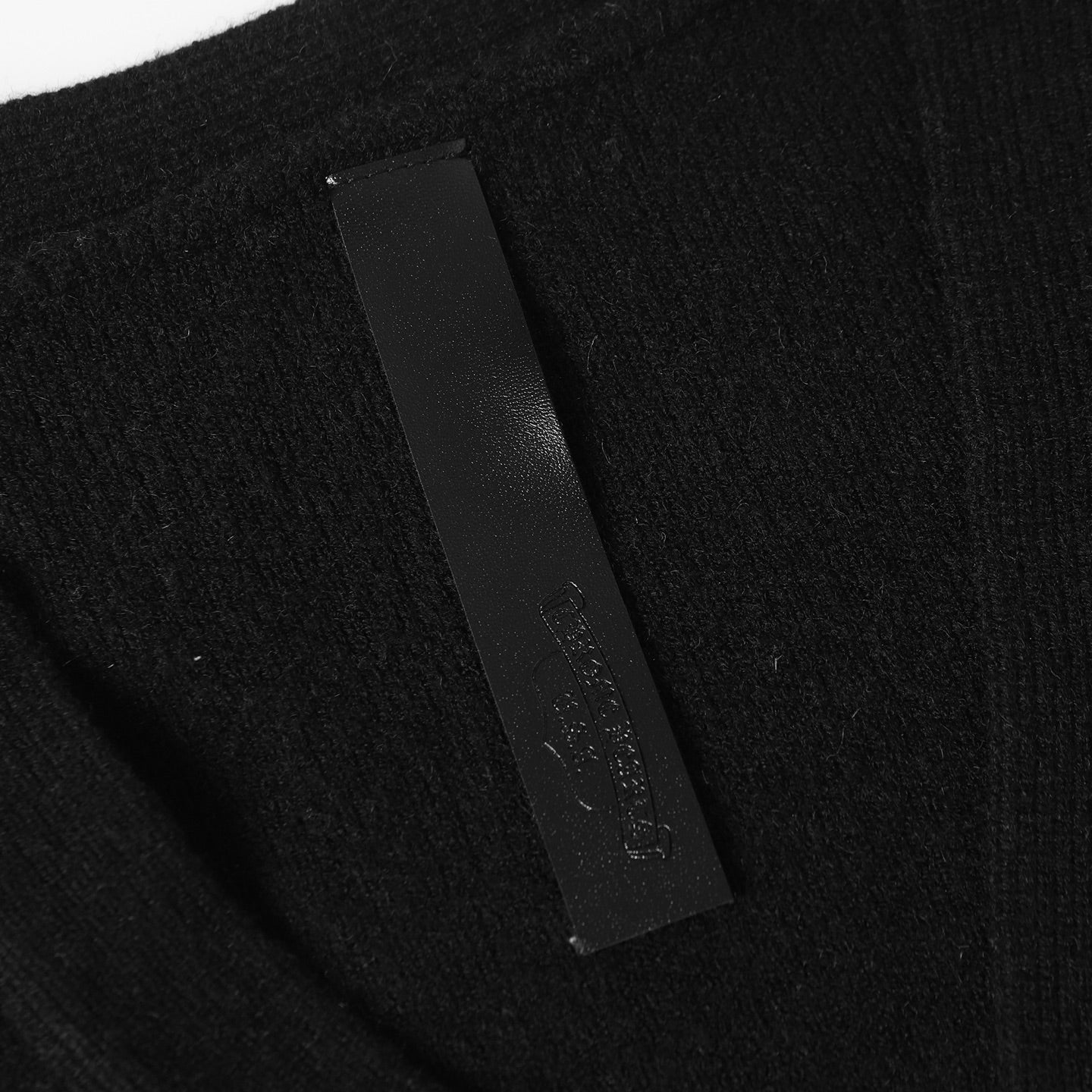 Black jacket interior fabric label