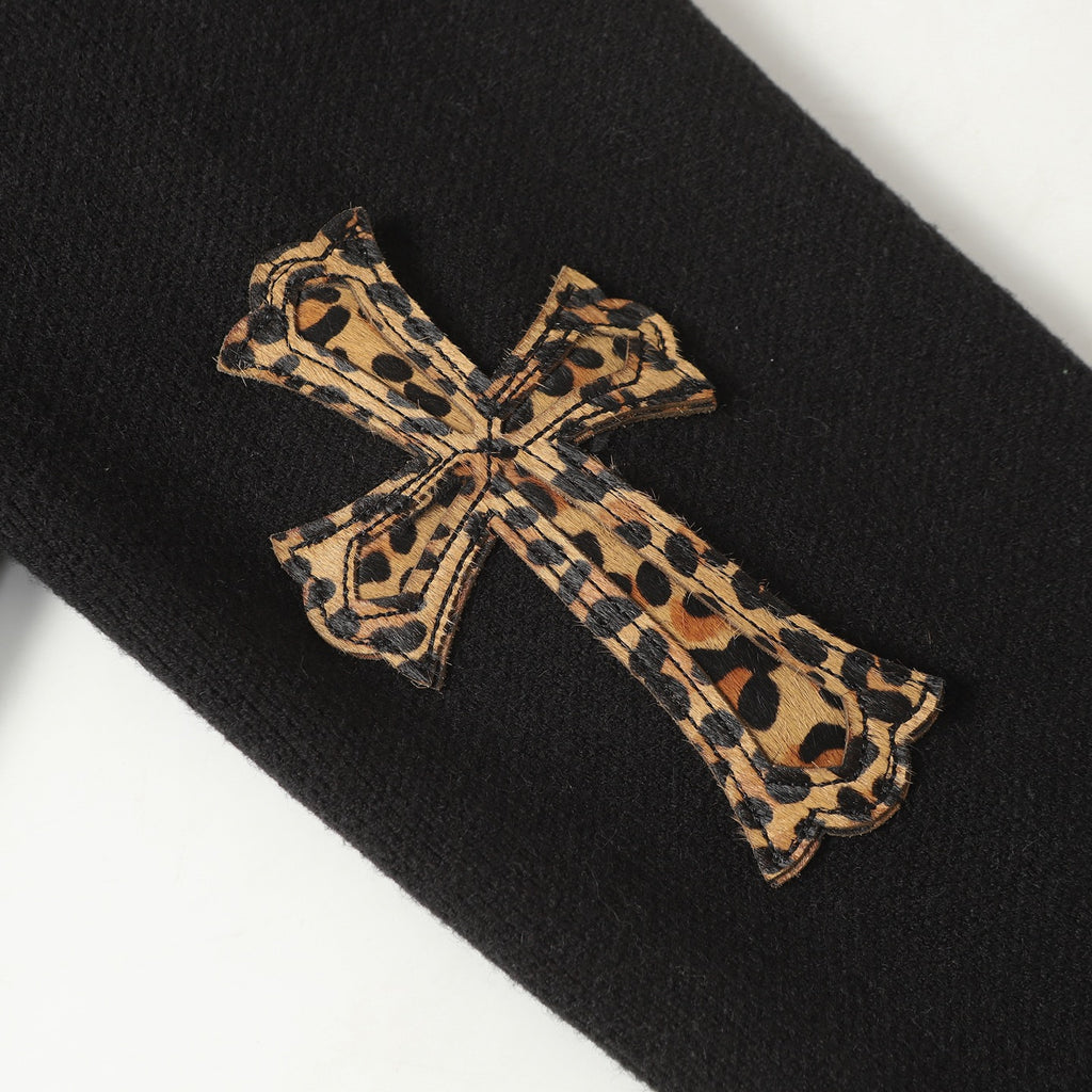 Leopard print bow applique on black jacket sleeve