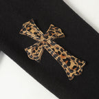 Leopard print bow applique on black jacket sleeve