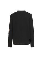 Black long-sleeve jacket back view with leopard bow detail on cuff
