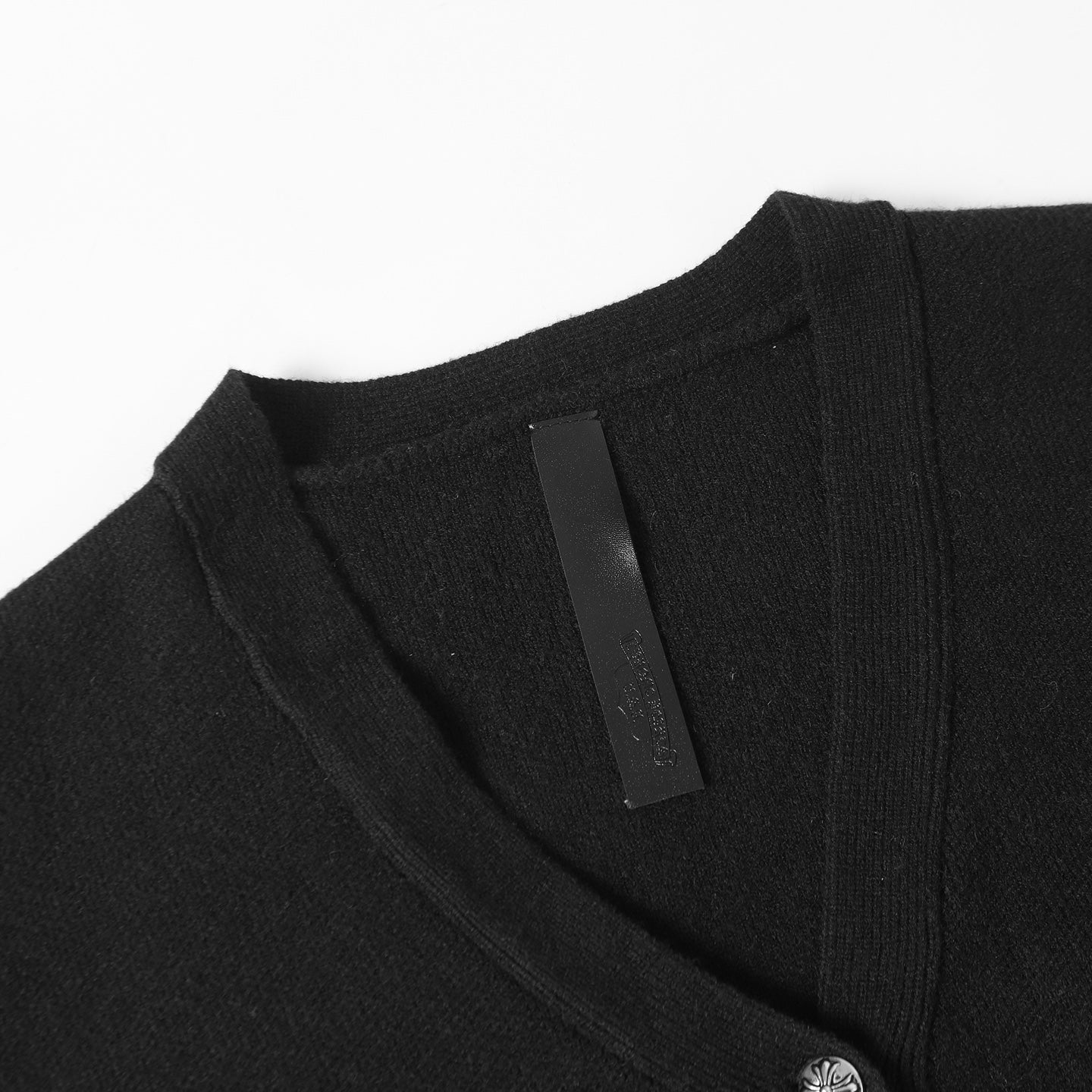 Black jacket neckline with inner tag label