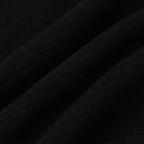 Dark knit fabric close-up with fine textured weave