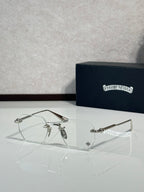 Chrome metal eyeglasses with clear lenses and thin gold wire arms