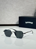Chrome metal sunglasses with dark gray tinted lenses and angular frame