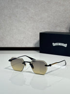 Chrome metal sunglasses with amber tinted lenses and angular shield frame