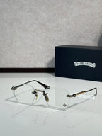 Chrome glasses with black frame and clear lenses, metal arms and bridge details