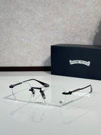 Chrome glasses with black frame and clear lenses, decorative metal bridge centerpiece