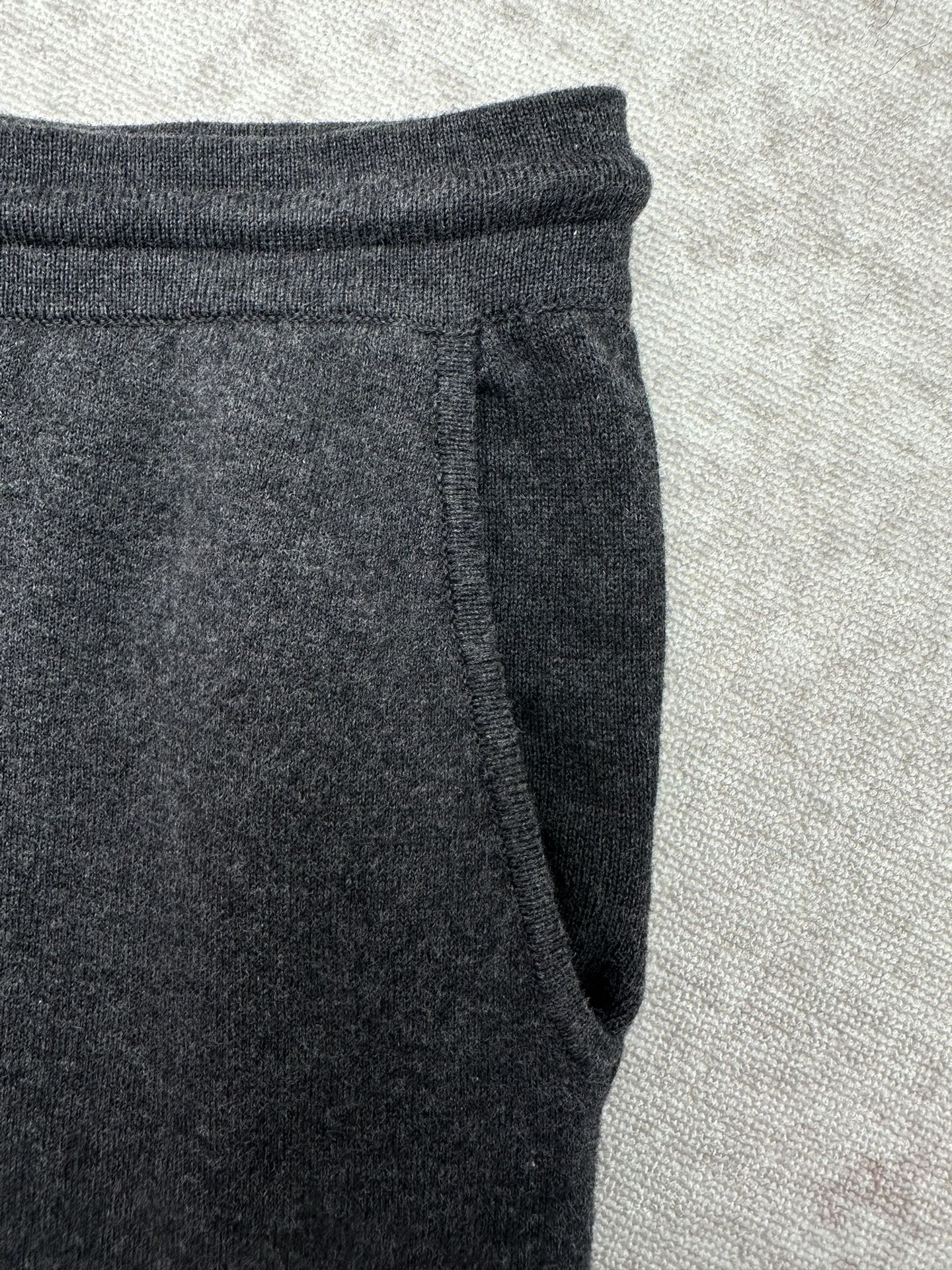 Louis Vuitton pants in dark color with side seam and tapered leg opening